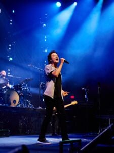 Train Performs Live Rock and Pop Music at a Performing Arts Center Show